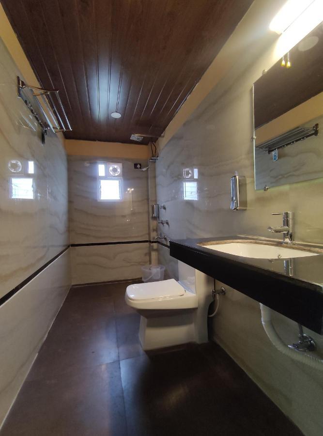 Jim'S Motel Kalchini Екстериор снимка